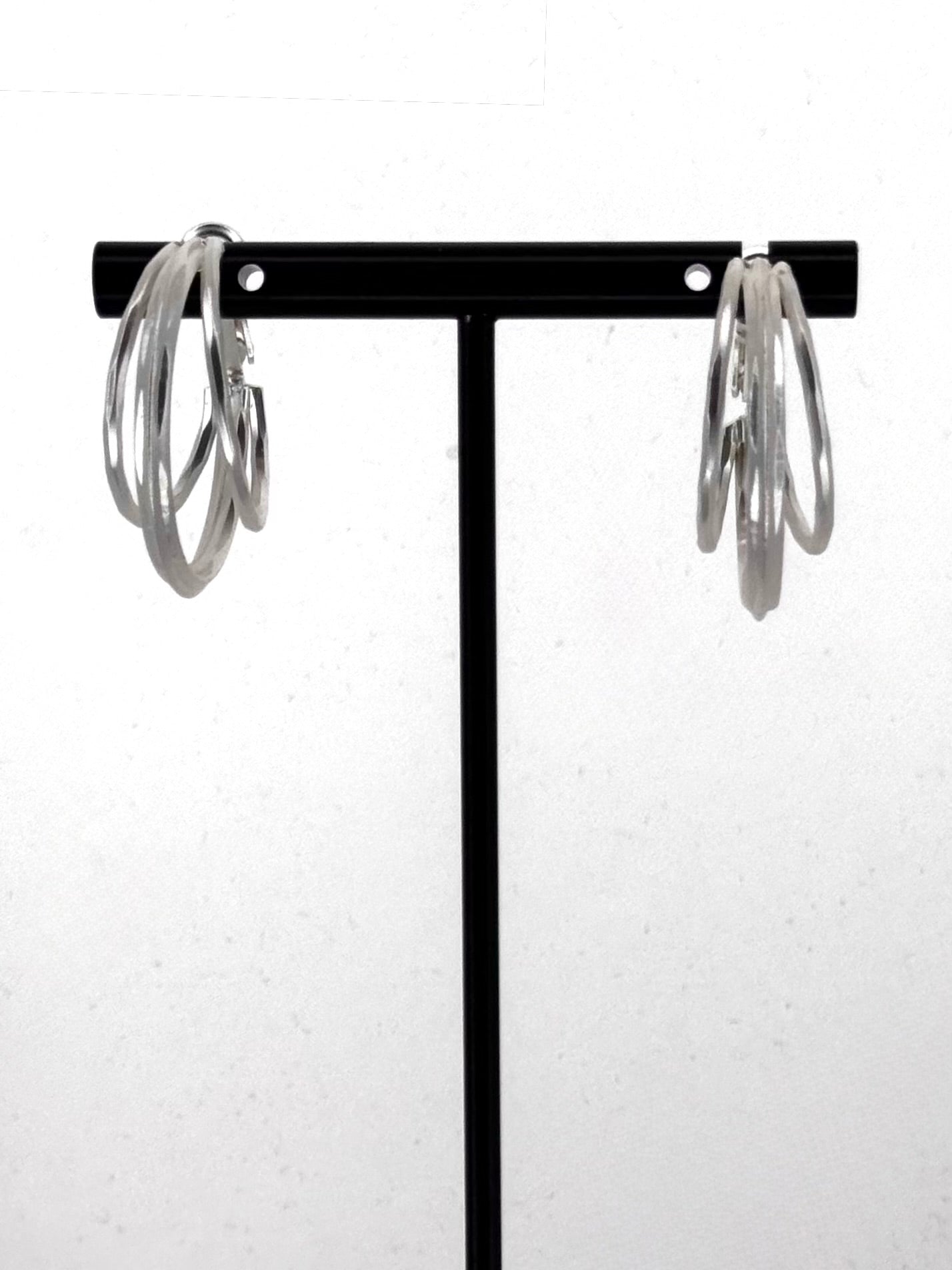 Twist Hoop Statement Earrings in Silver