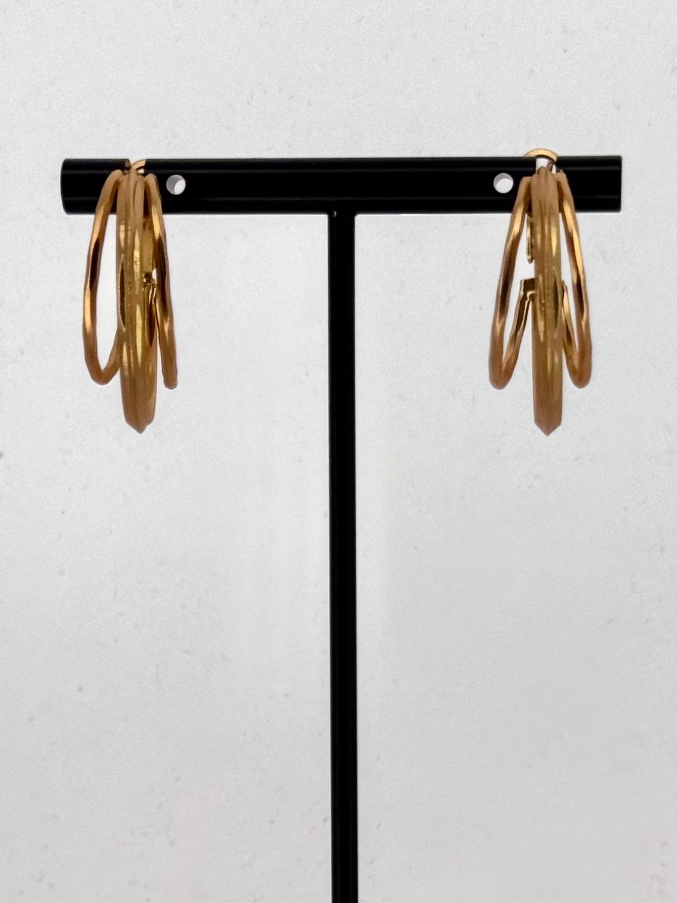 Twist Hoop Statement Earrings in Gold