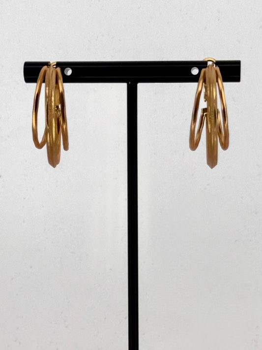 Twist Hoop Statement Earrings in Gold