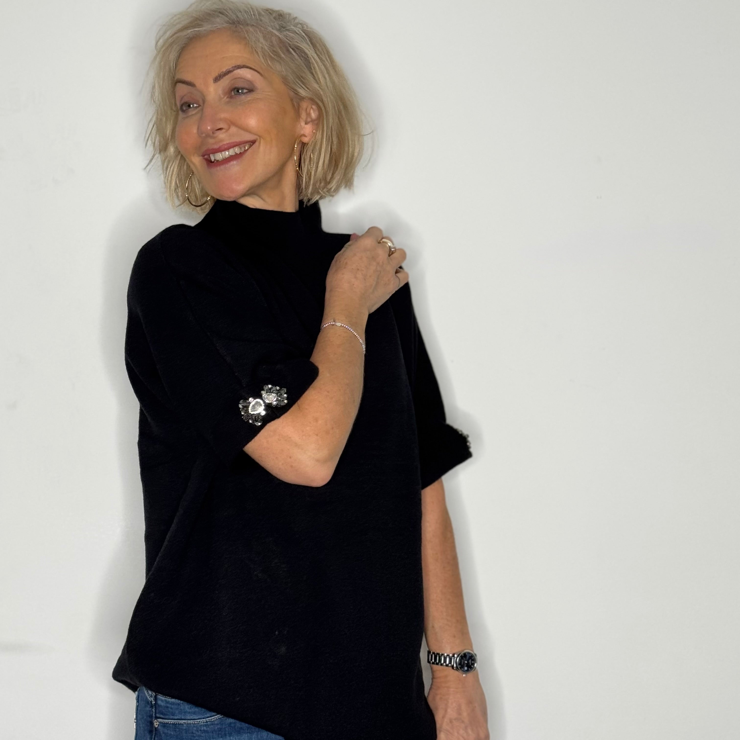 turtleneck knit with crystal sleeve embellishment