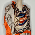 Blue and orange patterned scarf