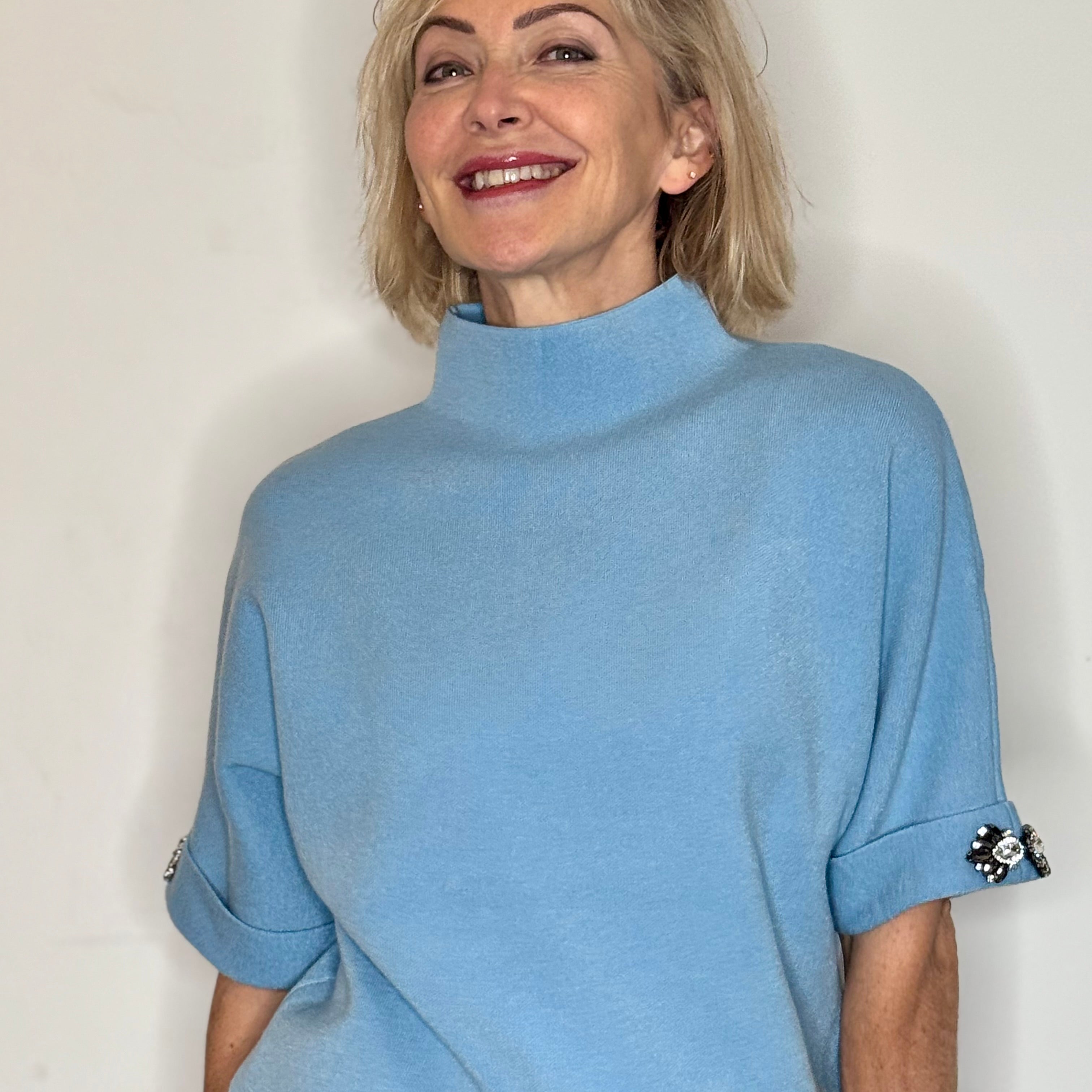 turtleneck knit with crystal sleeve embellishment