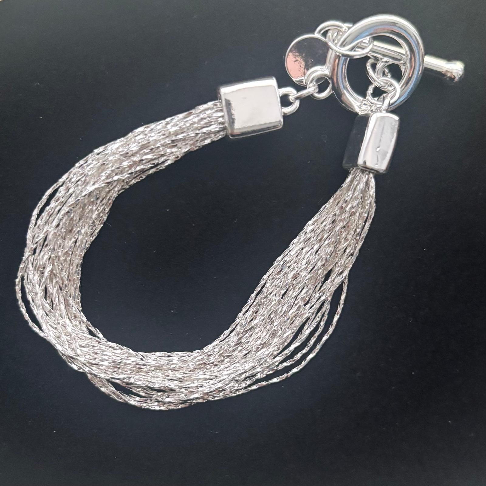 fine, short, silver multi strand bracelet