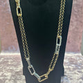 long necklace with gold and silver links